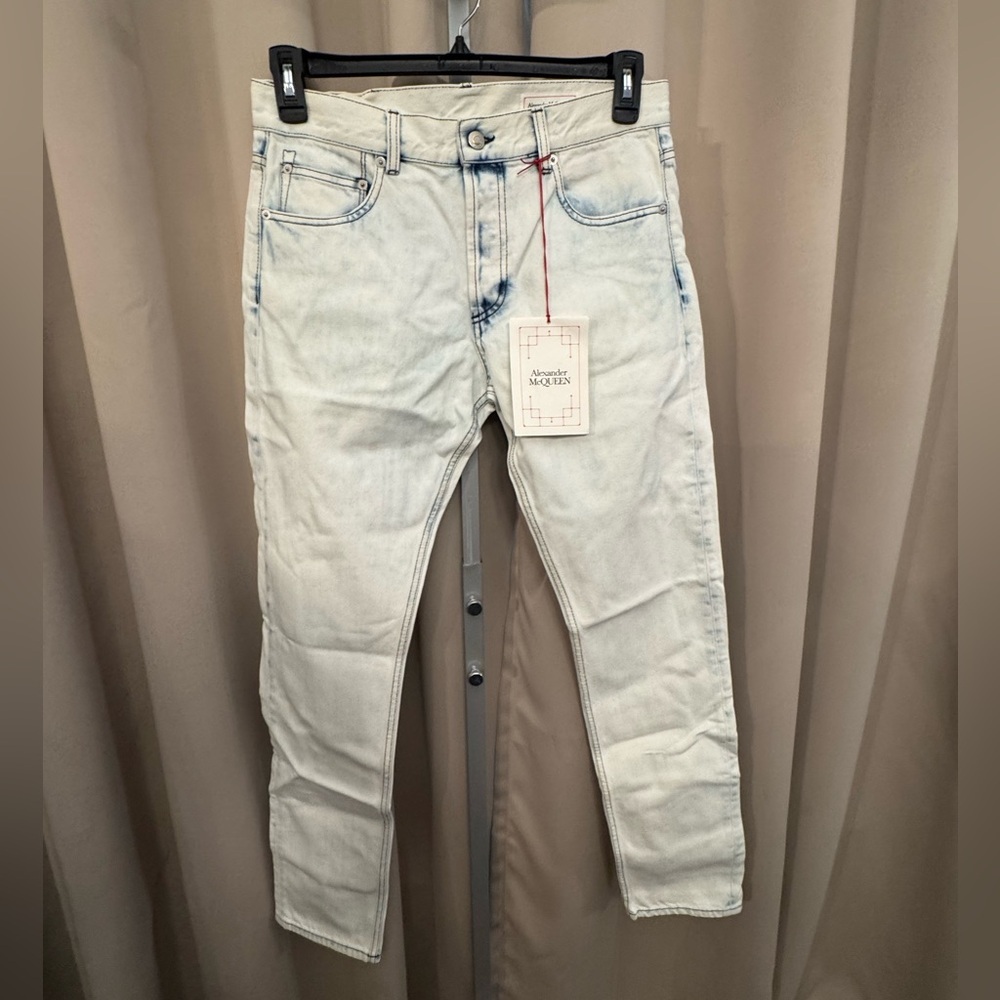 Alexander McQueen acid washed men’s jeans. The back patch has damage as pictured